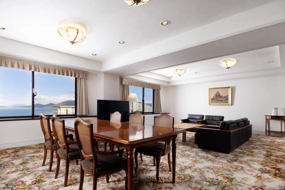 Deluxe Suite, Multiple Beds, Sea View | Down comforters, in-room safe, desk, free WiFi