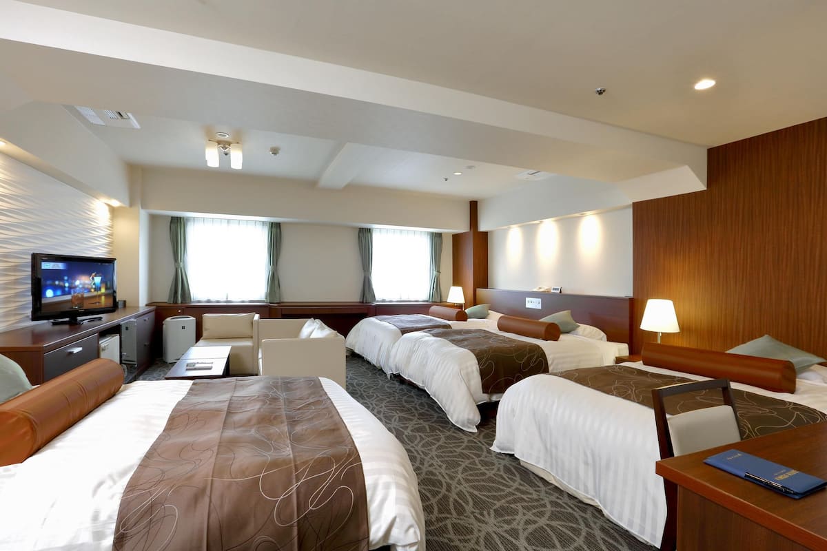 Quadruple Room | Premium bedding, laptop workspace, blackout drapes, soundproofing