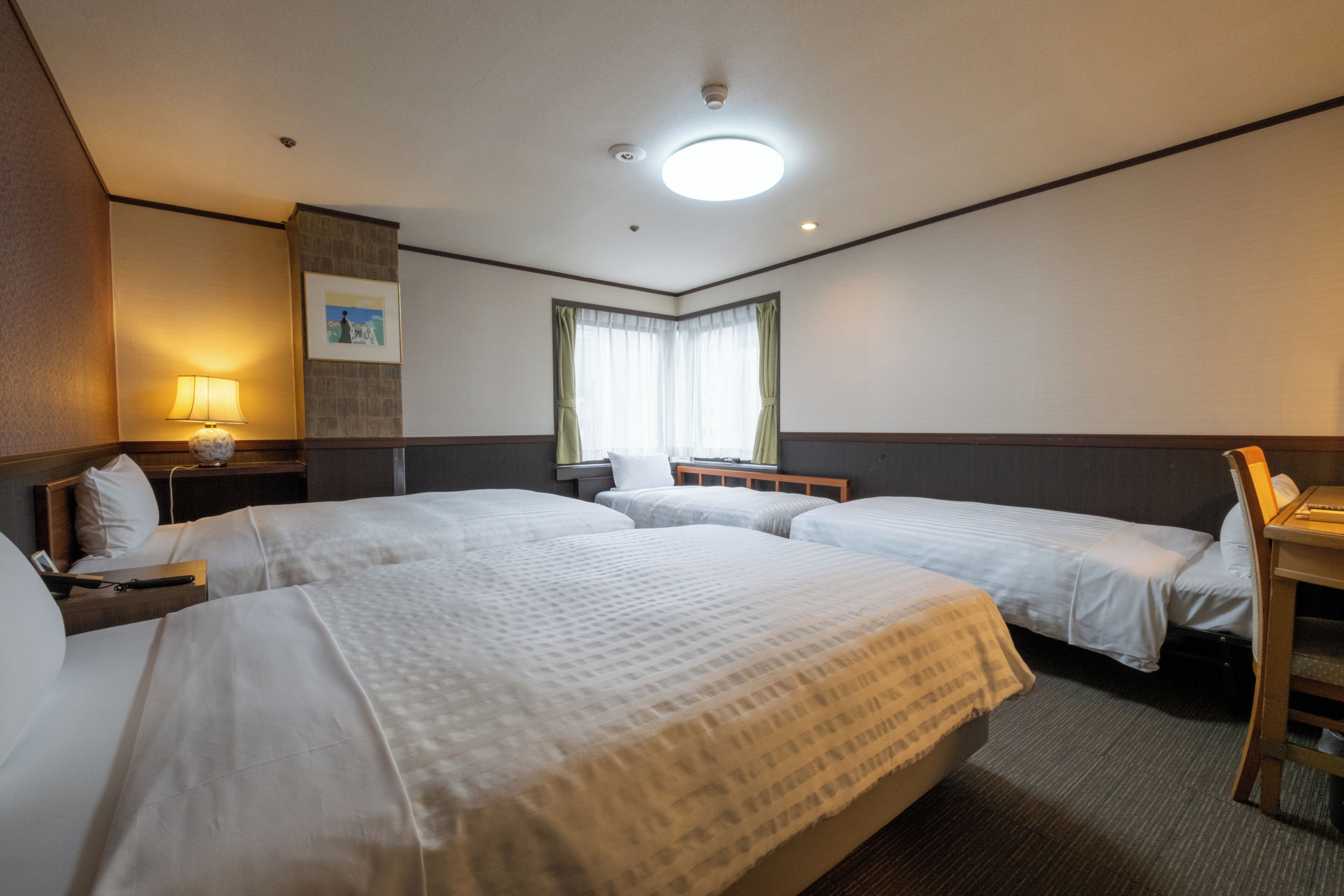 Standard Quadruple Room, Non Smoking, Corner | In-room safe, laptop workspace, iron/ironing board, free WiFi