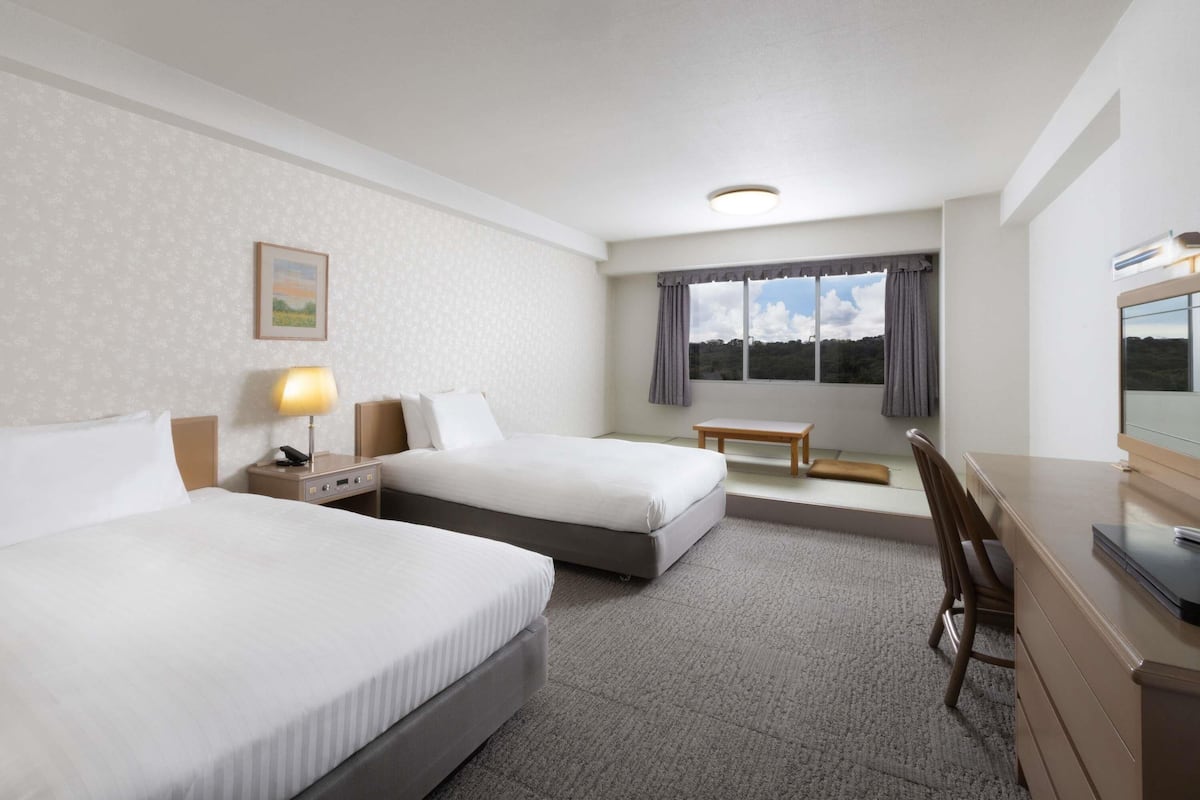 Classic Room, Japanese-Western style, 2 singlebeds and 2 futon beds | In-room safe, desk, free WiFi, bed sheets