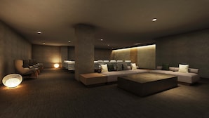 A modern lounge area with a sofa set, chairs, and a coffee table. - Mercure Fukuoka Munakata Resort & Spa (Munakata)