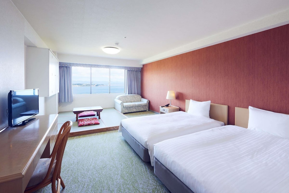 Classic Room, Multiple Beds, Sea View | In-room safe, desk, laptop workspace, blackout drapes