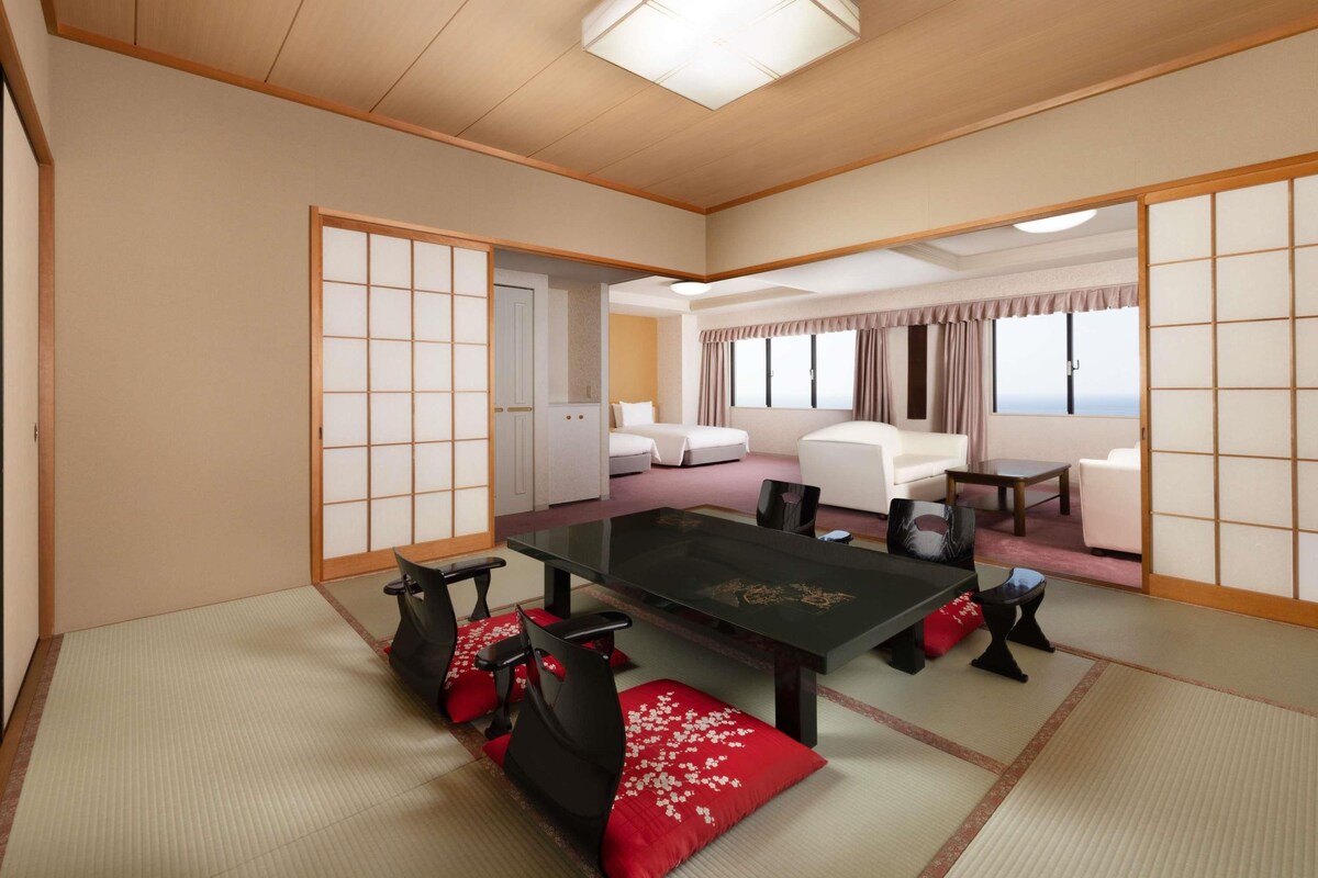 Junior Suite, 2 Twin Beds, Sea View | In-room safe, desk, laptop workspace, blackout drapes