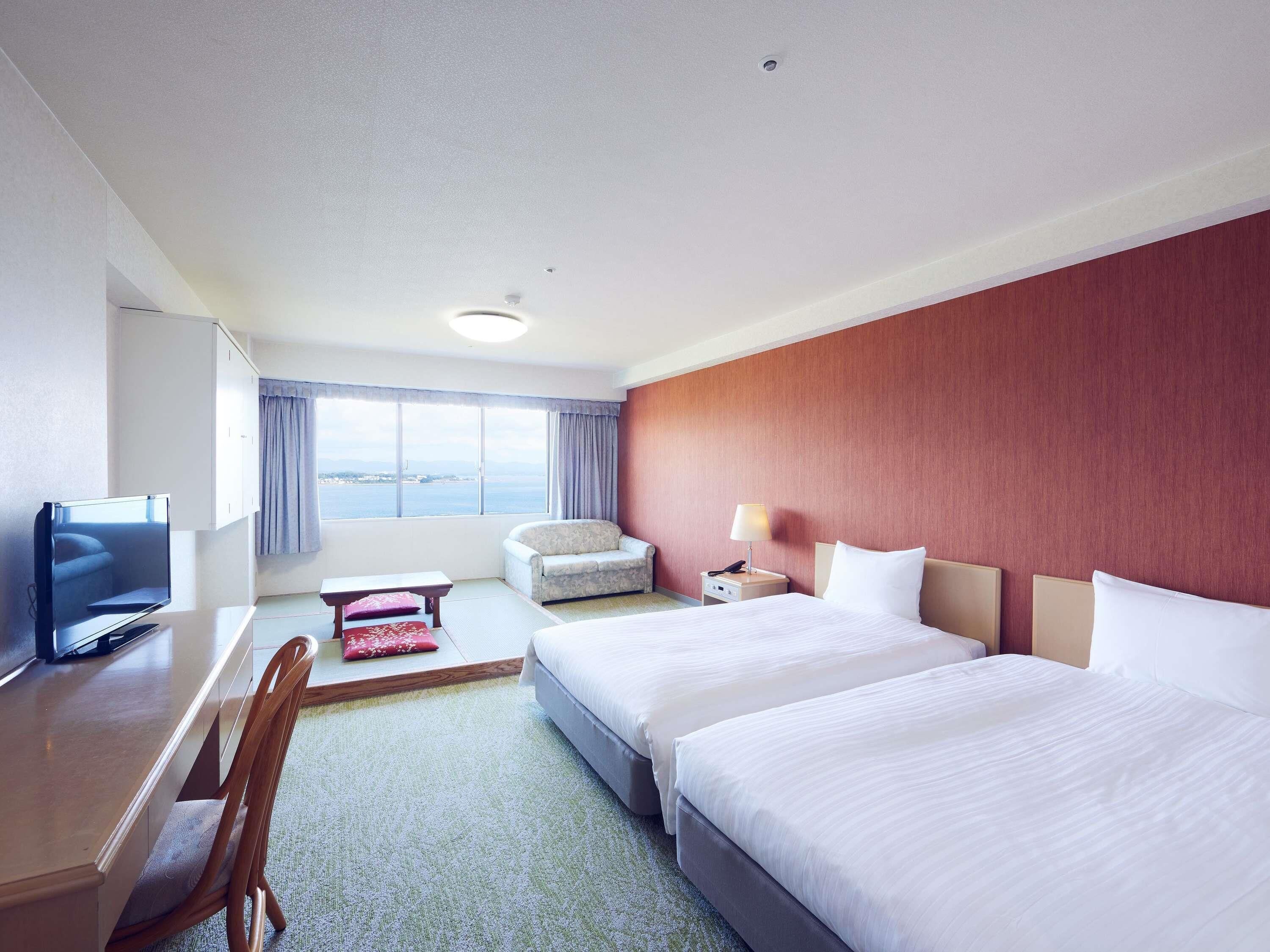 Classic Room, Multiple Beds, Sea View | In-room safe, desk, laptop workspace, blackout curtains
