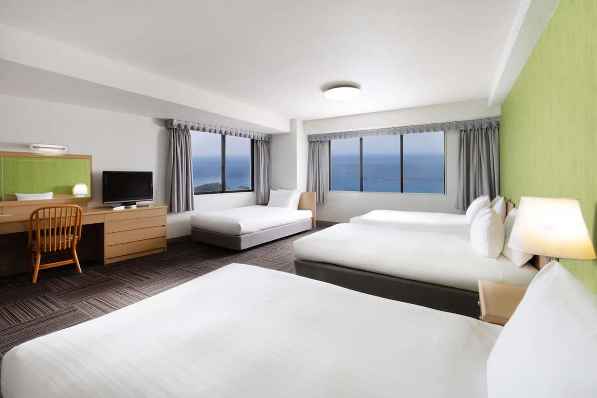 Classic Room with 2 single and 1 sofa and 2 futon beds, Ocean/Sea view | In-room safe, desk, laptop workspace, blackout drapes