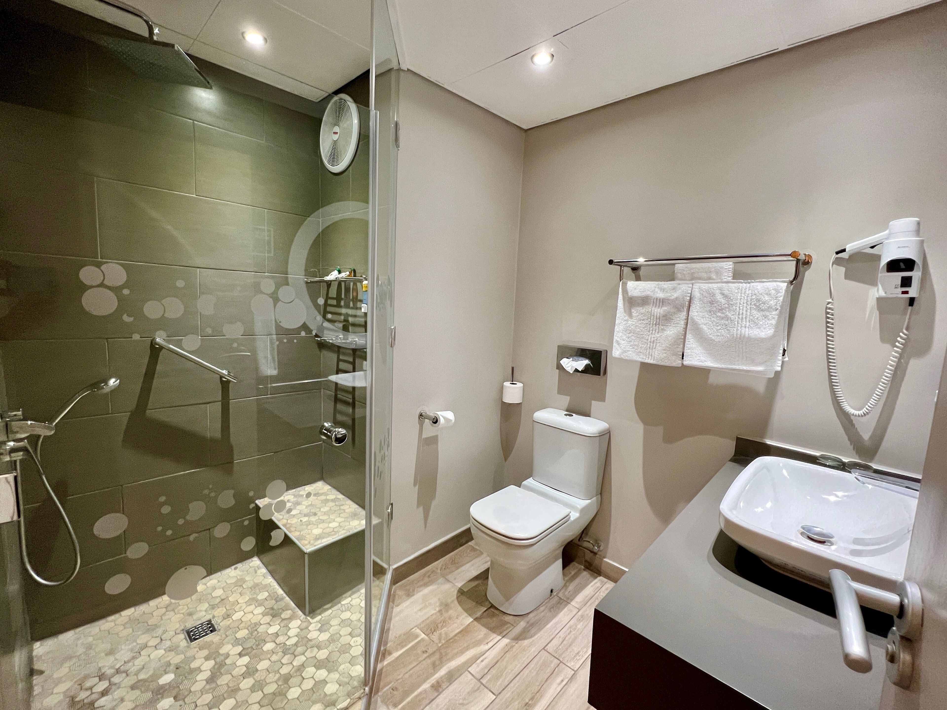 deep-soaking bathtub, free toiletries, hair dryer, towels