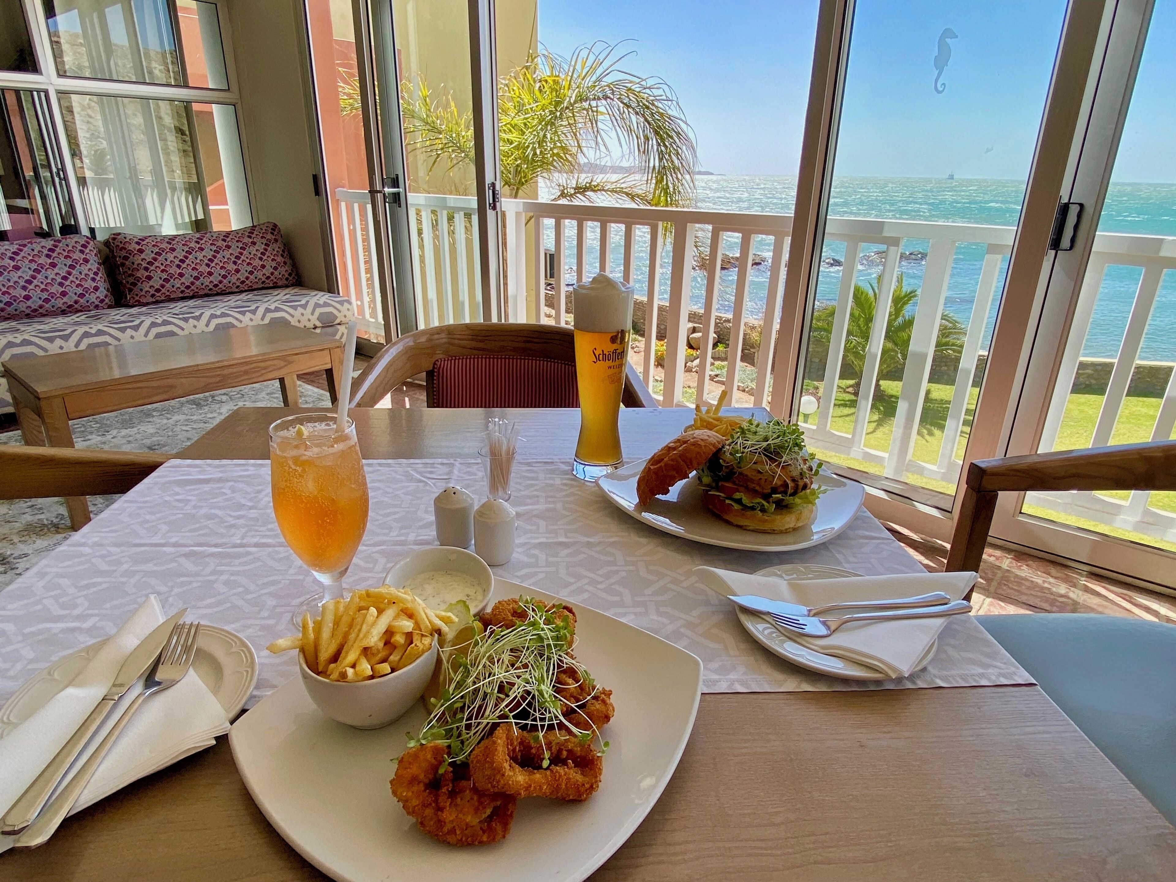 Breakfast, lunch, dinner served; international cuisine, beach views 
