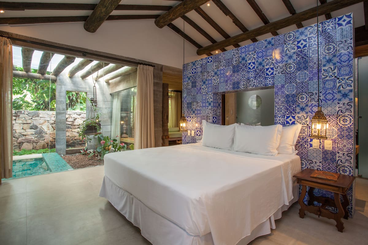 romantic double room, private pool | minibar, in-room safe, desk, blackout curtains