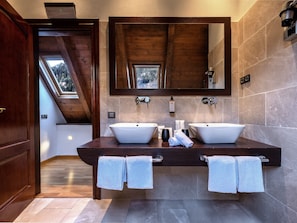 Designer toiletries, hair dryer, bidet, towels