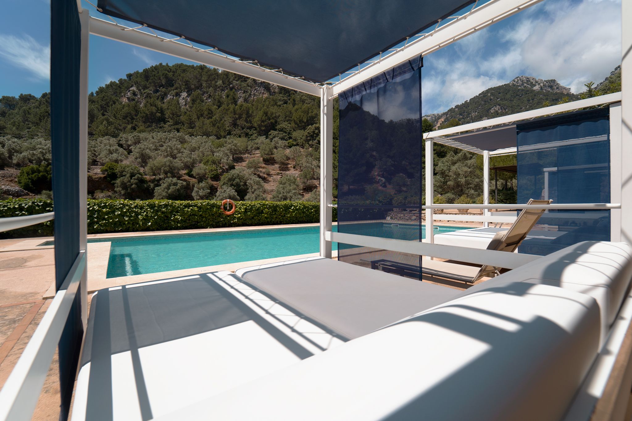 Outdoor pool, pool umbrellas, sun loungers