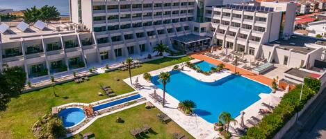 Outdoor pool, pool umbrellas, pool loungers