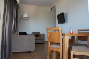 26-inch flat-screen TV with satellite channels, TV