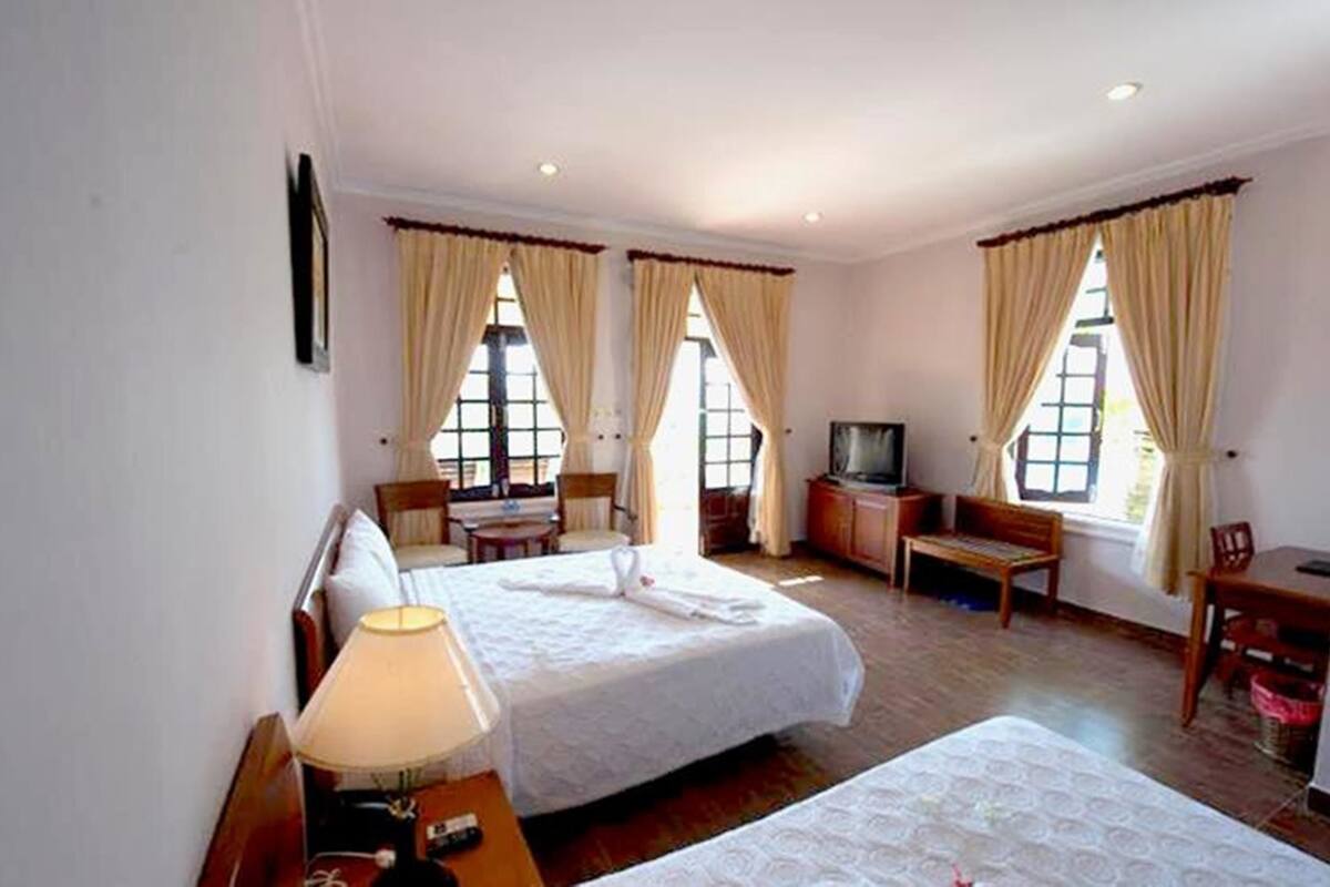 Bungalow, quang cảnh vườn | Minibar, két bảo mật tại phòng, bàn