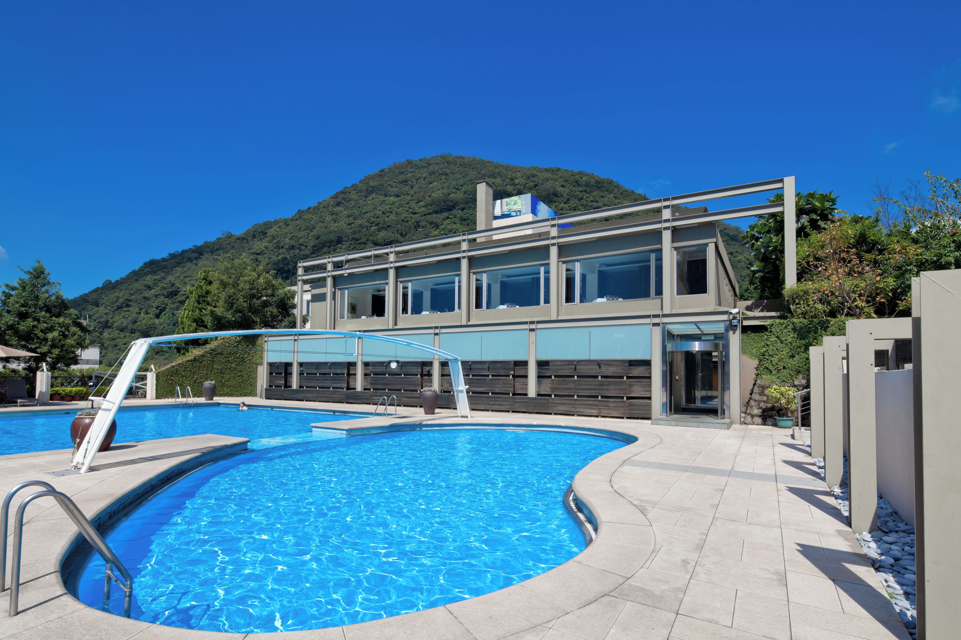 Outdoor pool, pool umbrellas, sun loungers