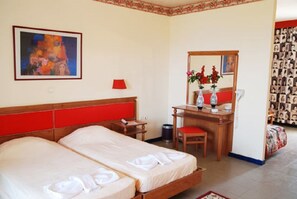 Premium bedding, blackout curtains, iron/ironing board
