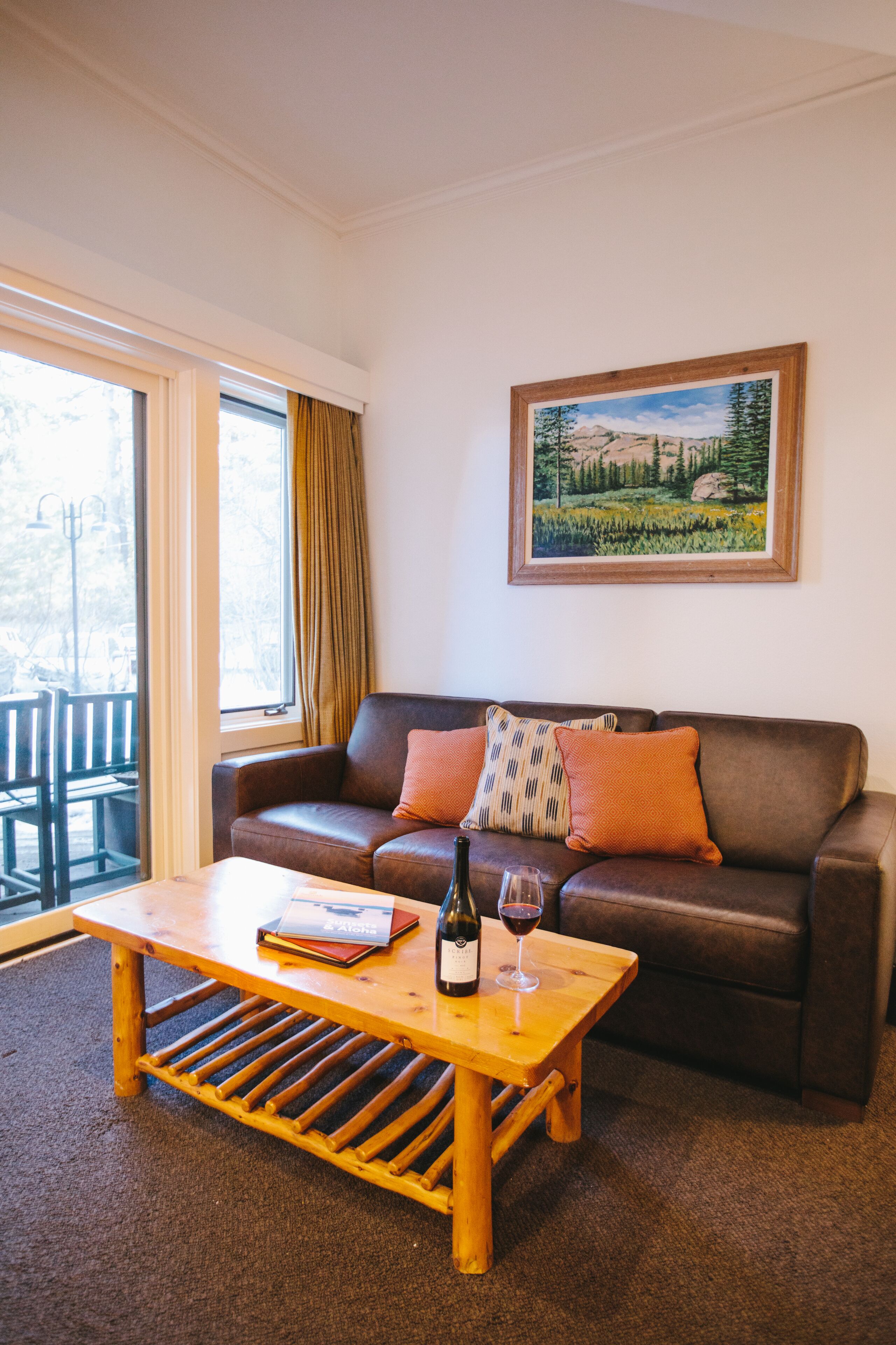 garden view 1 bedroom suite with queen bed and queen sofa bed | living area | ipod dock