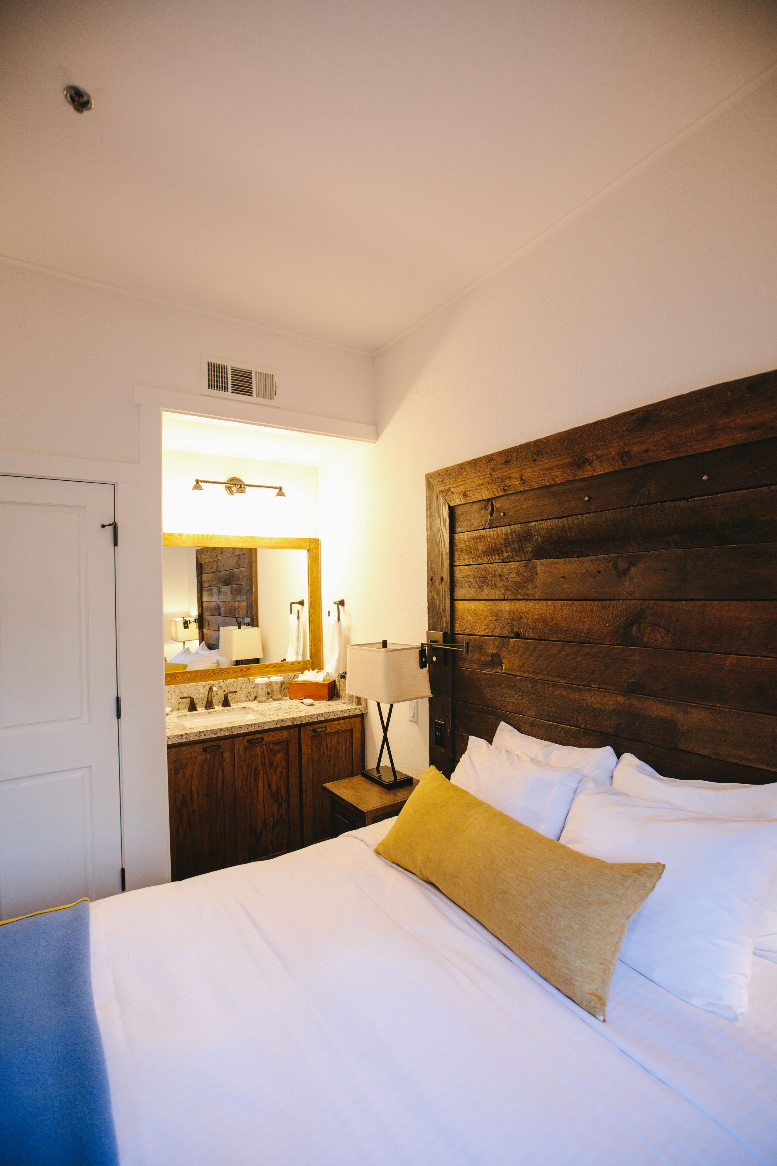 garden view 1 bedroom suite with queen bed and queen sofa bed | premium bedding, down duvets, in-room safe, individually decorated