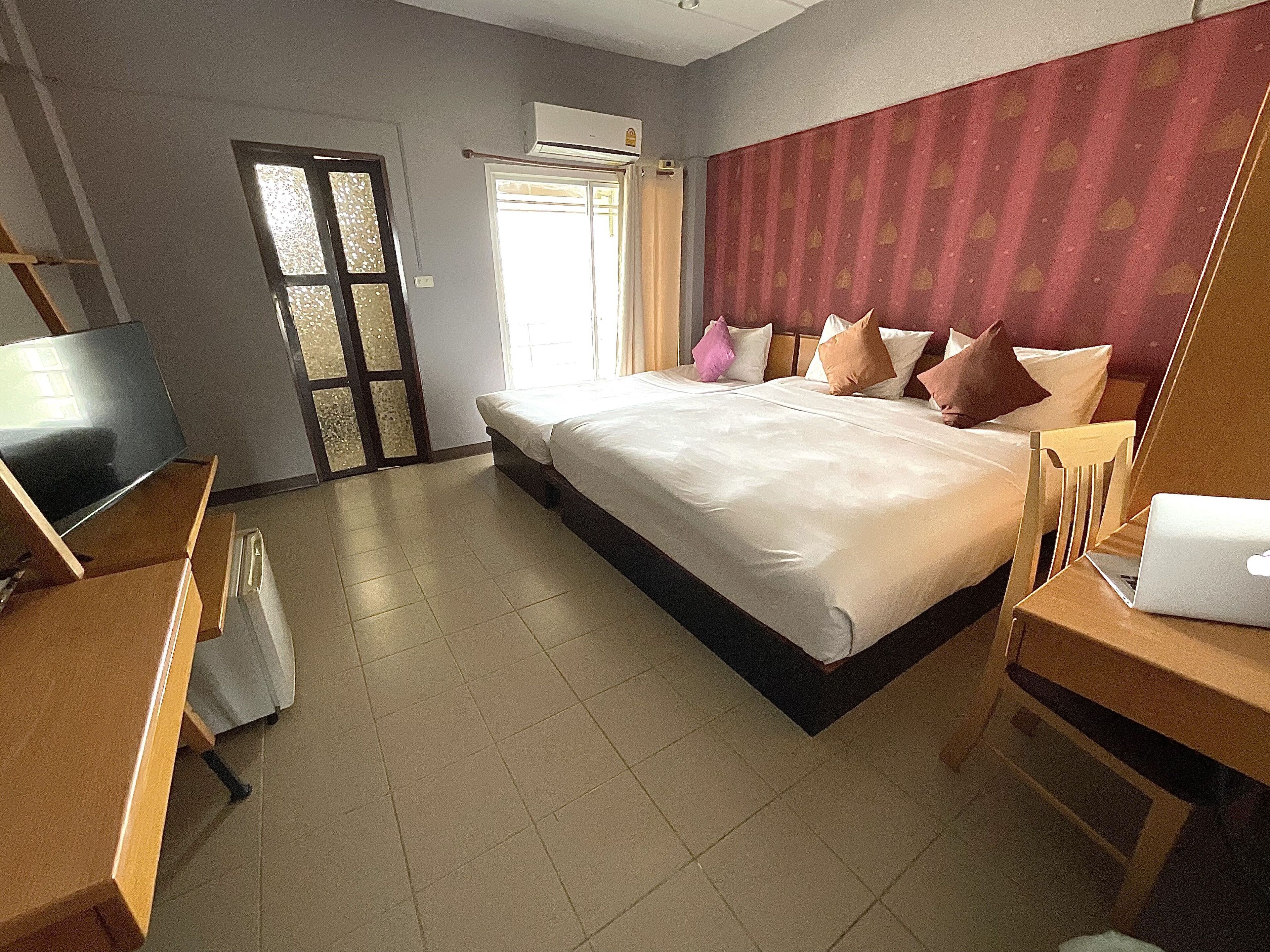 deluxe triple room | premium bedding, pillow-top beds, desk, free wifi