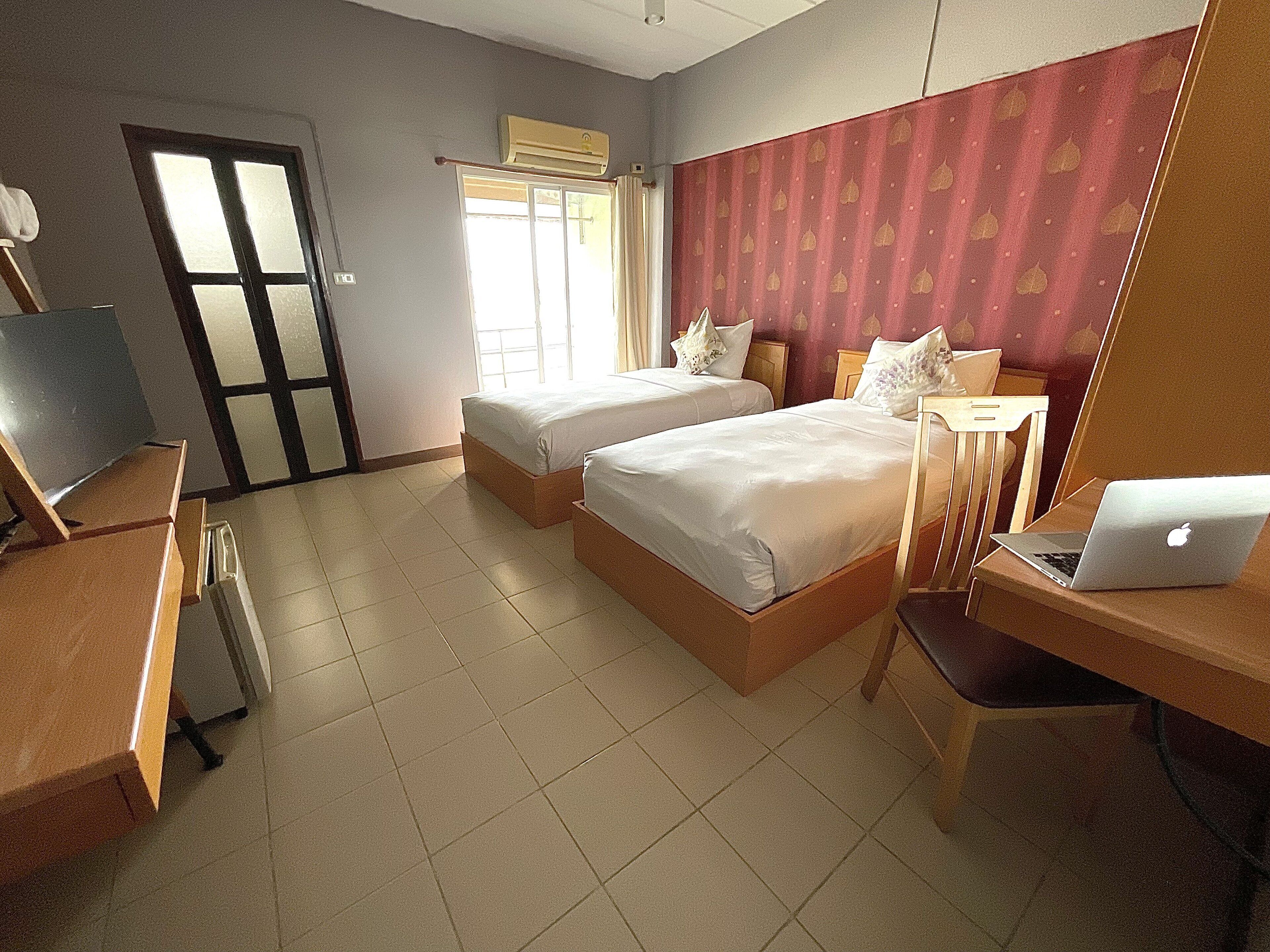 superior twin room | premium bedding, pillow-top beds, desk, free wifi