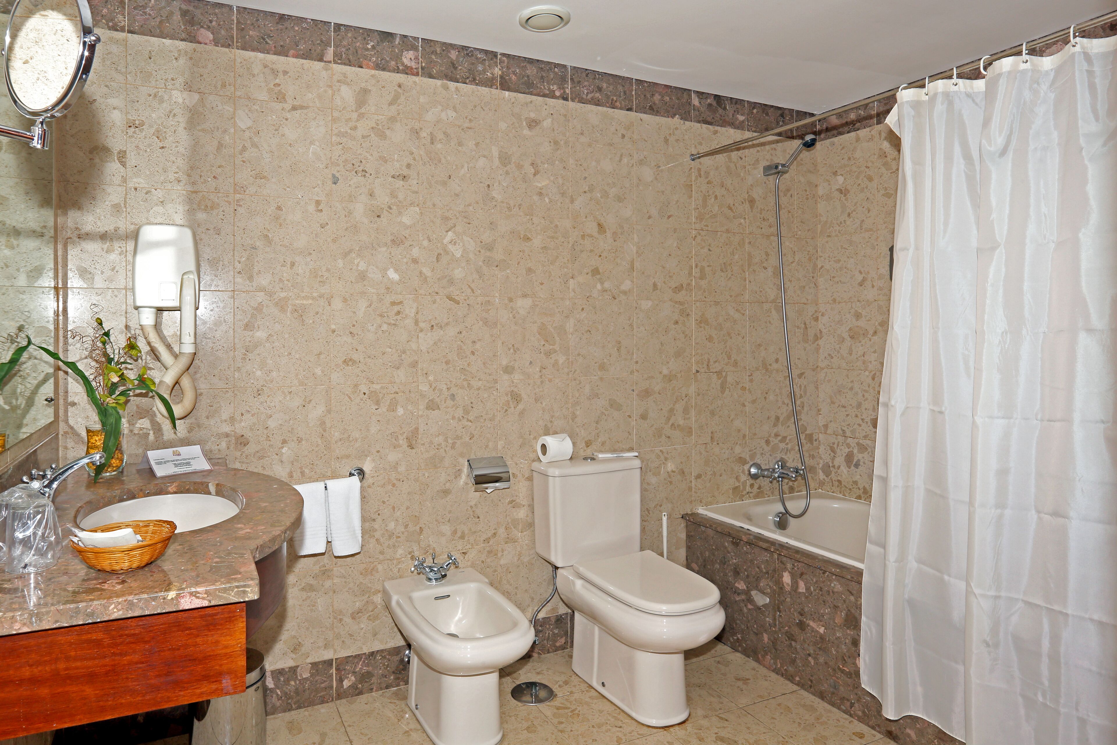 bathtub, free toiletries, hair dryer, bathrobes