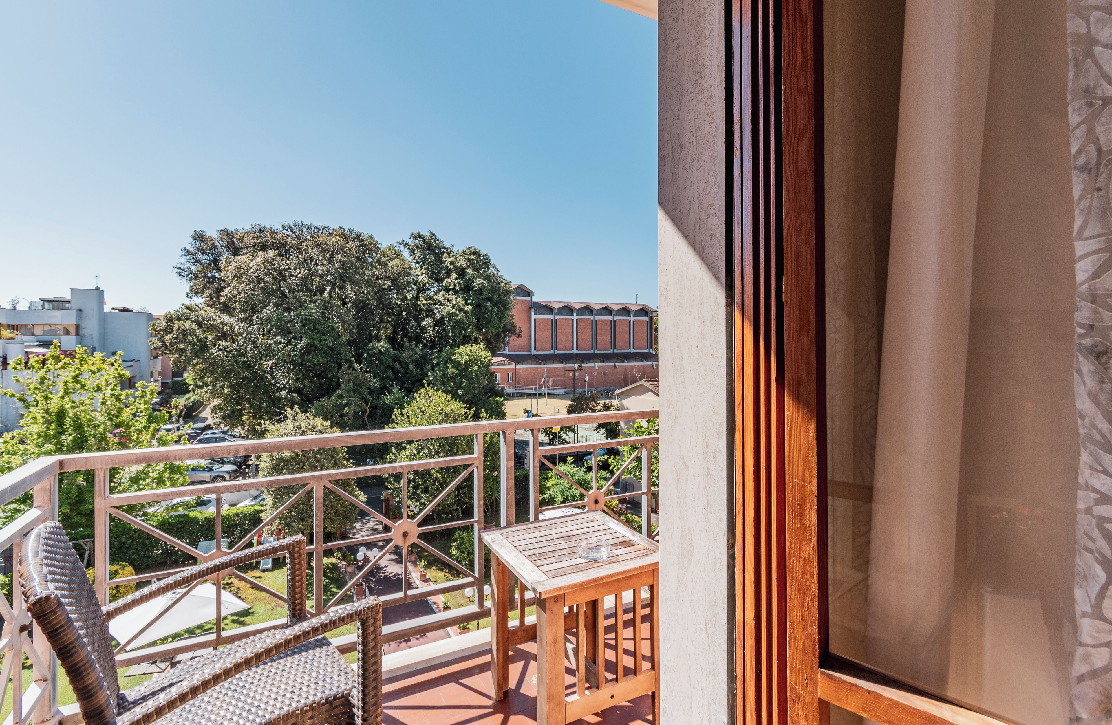 superior double room, 1 double or 2 single beds, balcony, garden view | minibar, in-room safe, desk, cots/infant beds