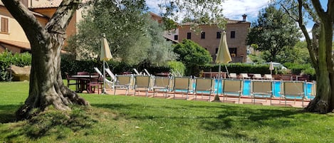 Outdoor pool, pool umbrellas, pool loungers