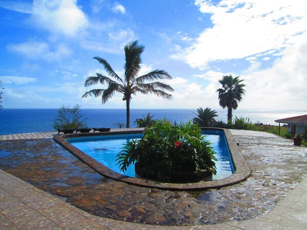 Outdoor pool, sun loungers