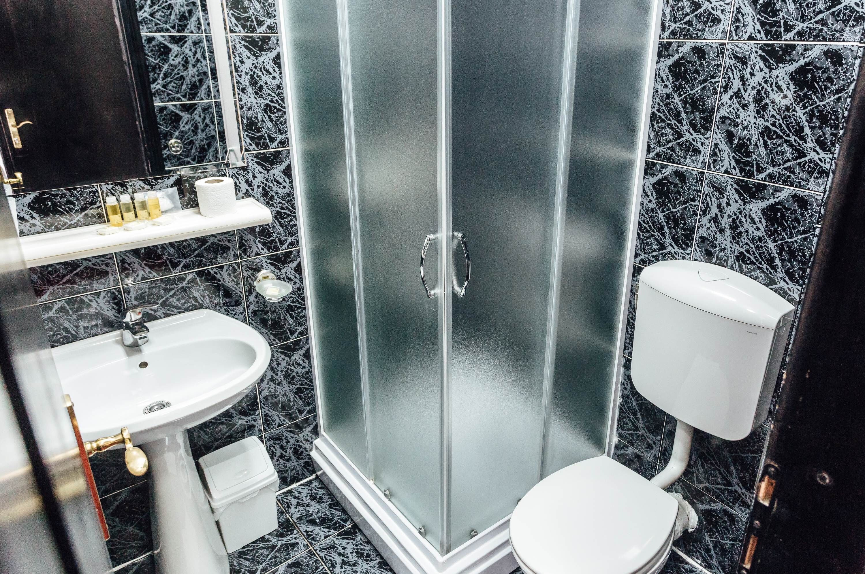 superior room | bathroom | shower, free toiletries, hair dryer, soap