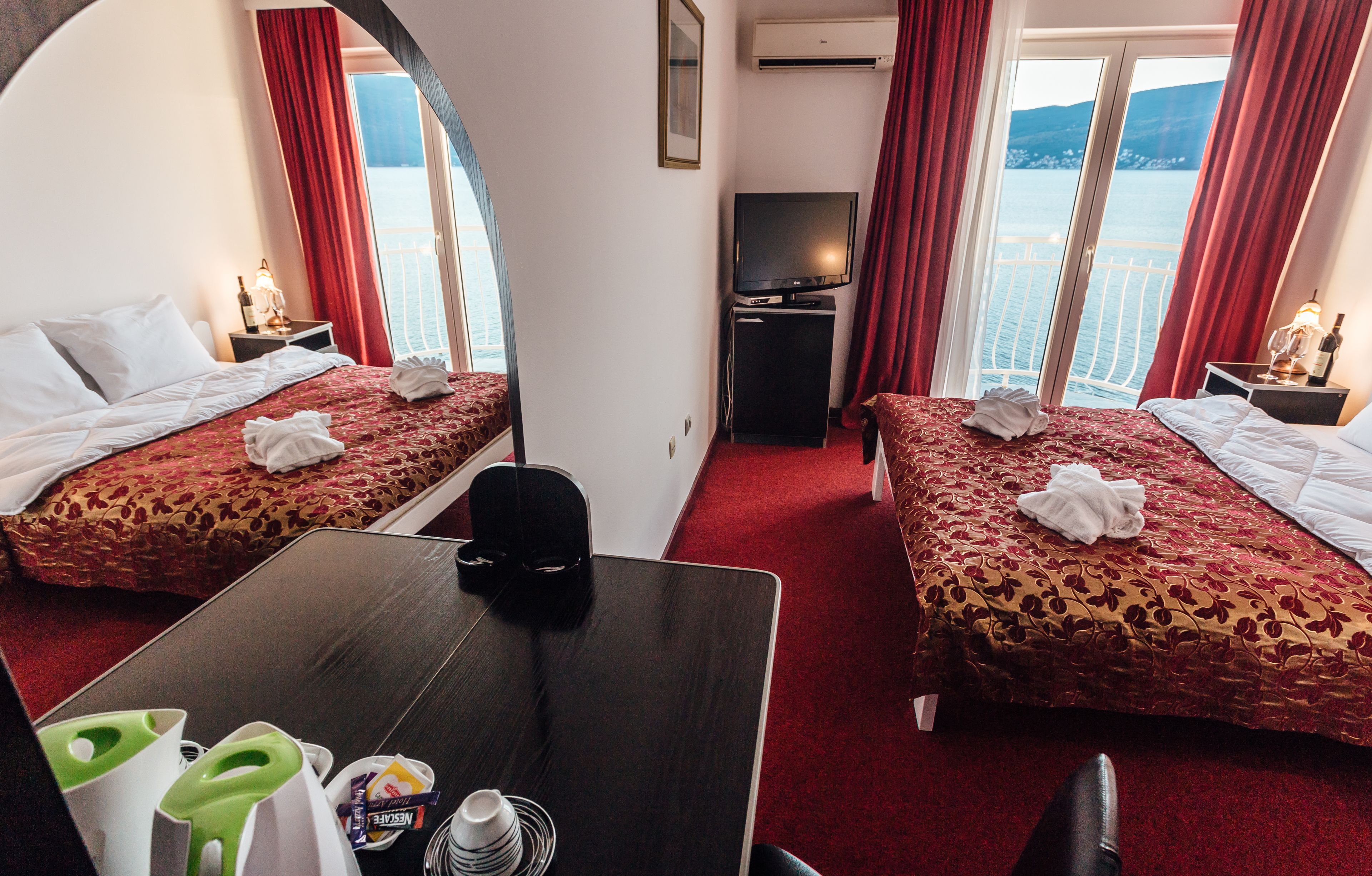 standard double room, sea view | minibar, in-room safe, individually decorated, individually furnished