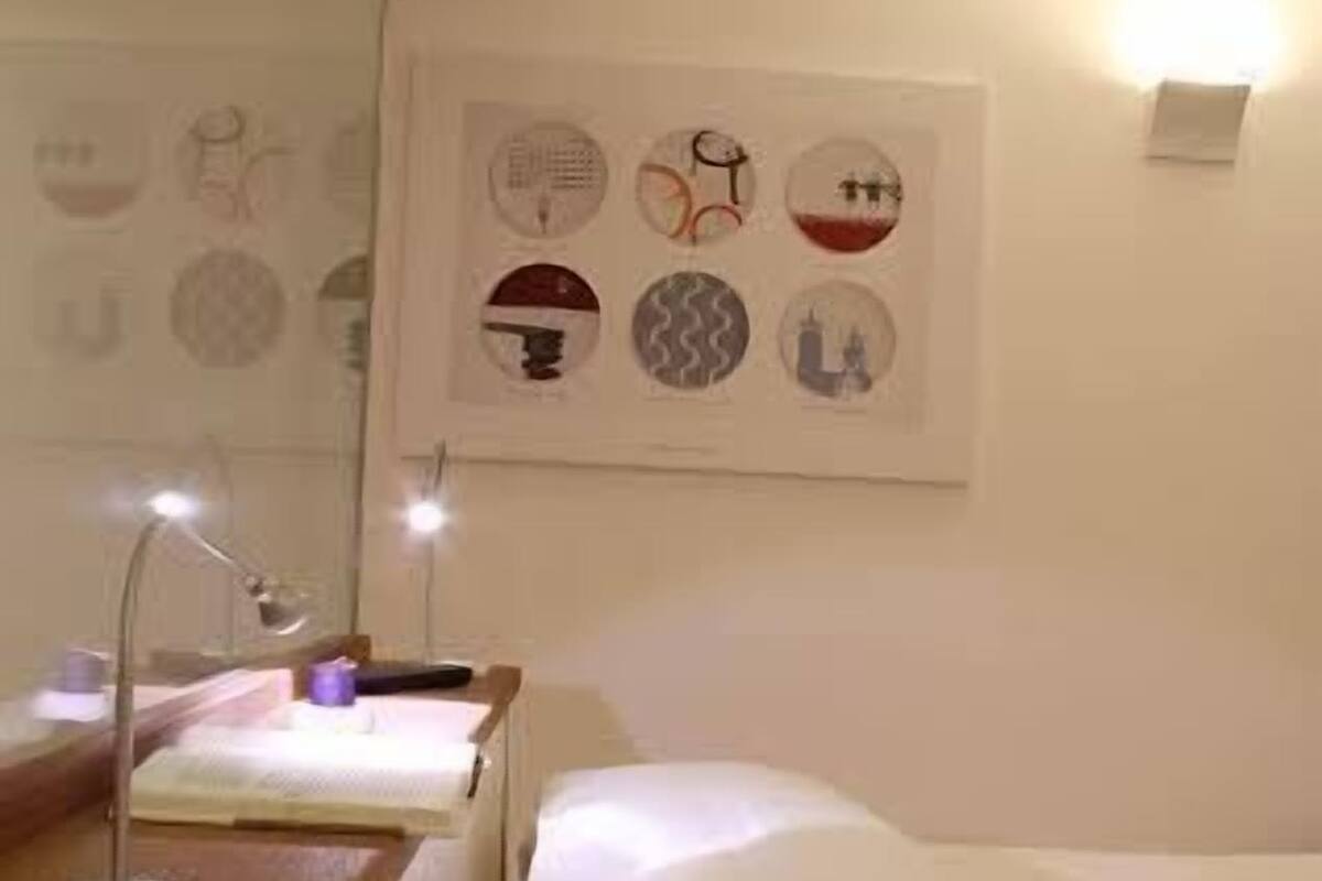 Double Room | Minibar, in-room safe, iron/ironing board, cots/infant beds