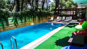 Seasonal outdoor pool, pool umbrellas