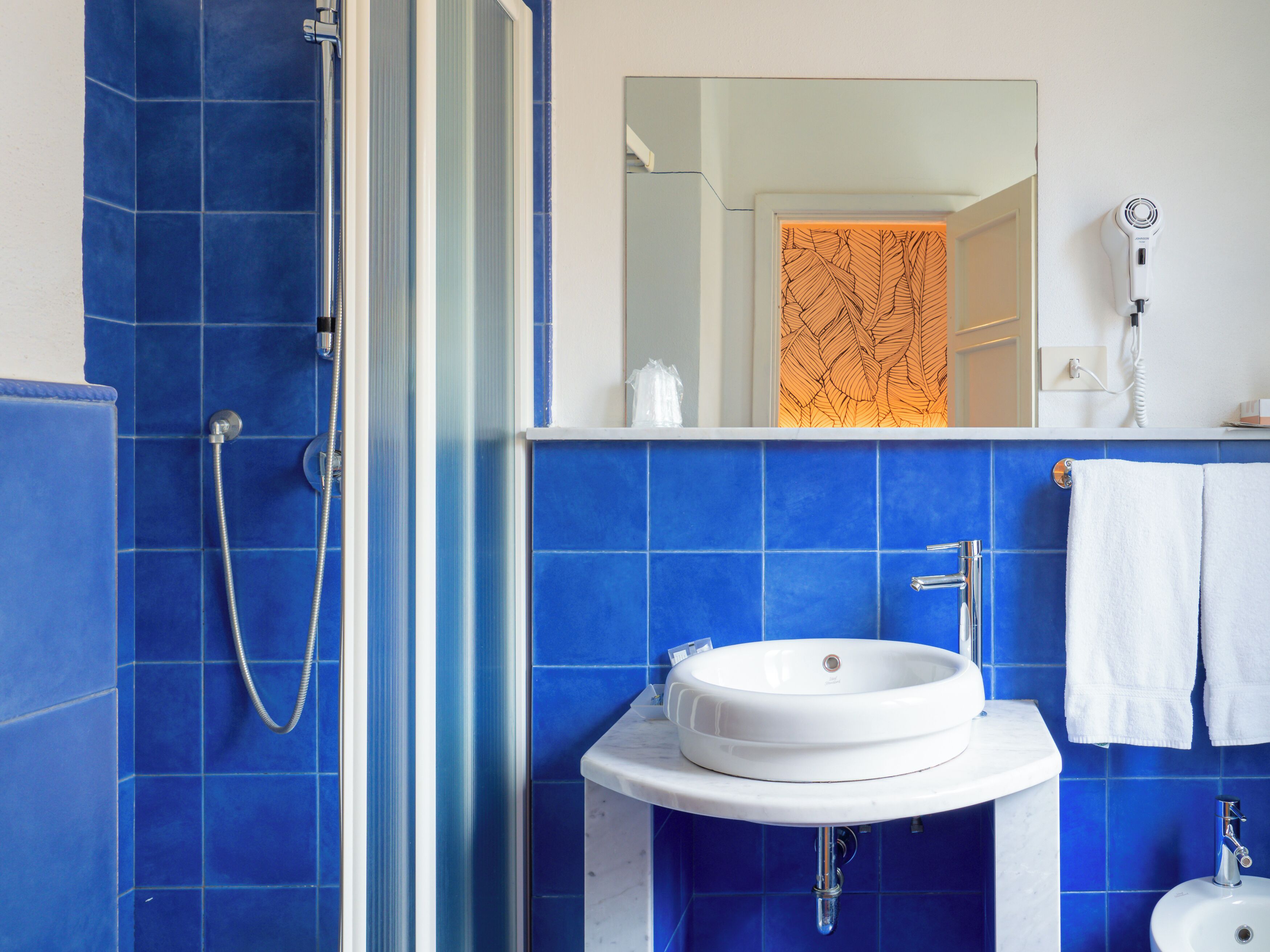 economy double room | bathroom | shower, rainfall showerhead, free toiletries, hair dryer