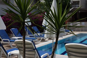 Outdoor pool, pool umbrellas, pool loungers