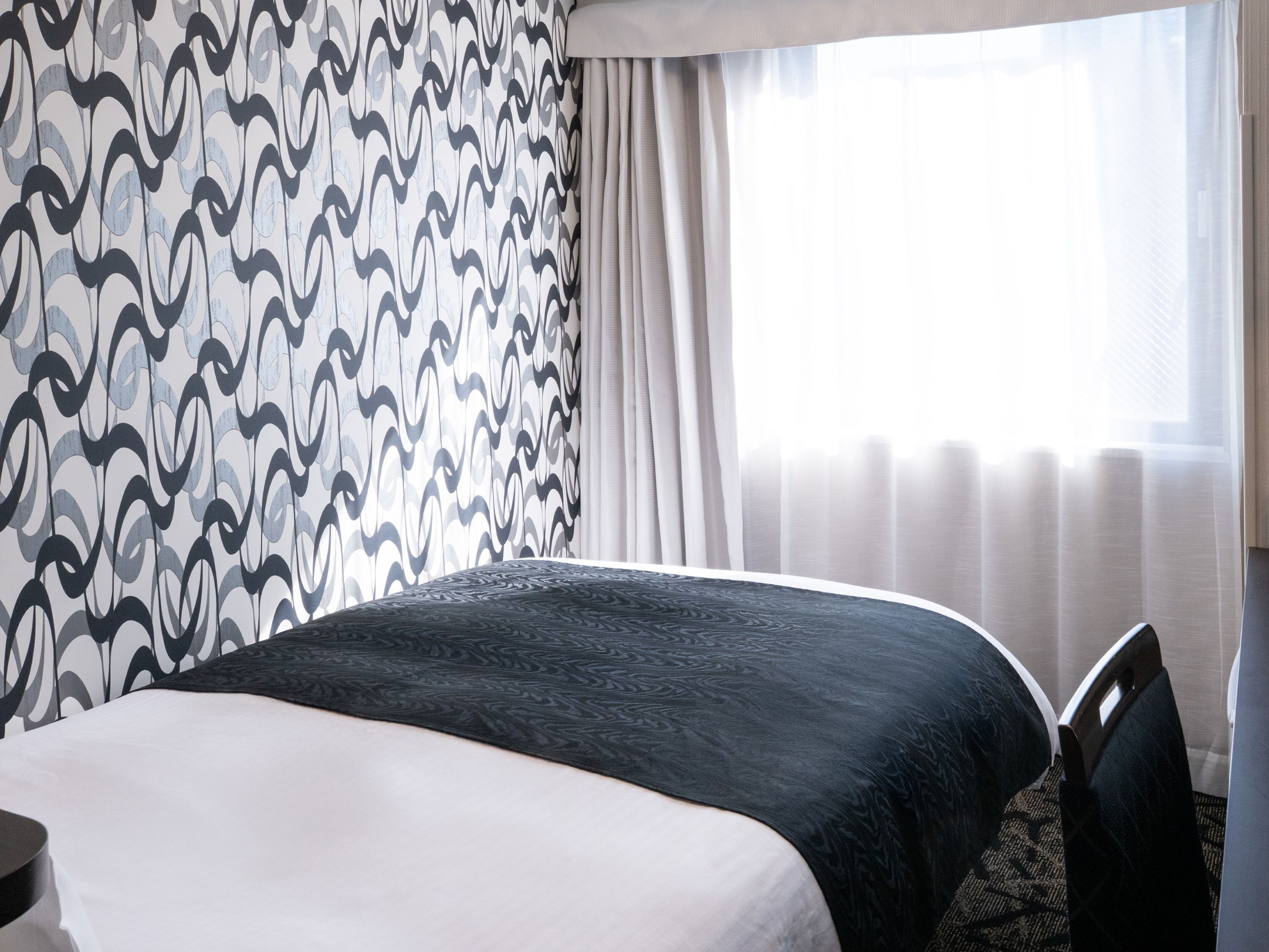 Down duvets, desk, blackout curtains, iron/ironing board