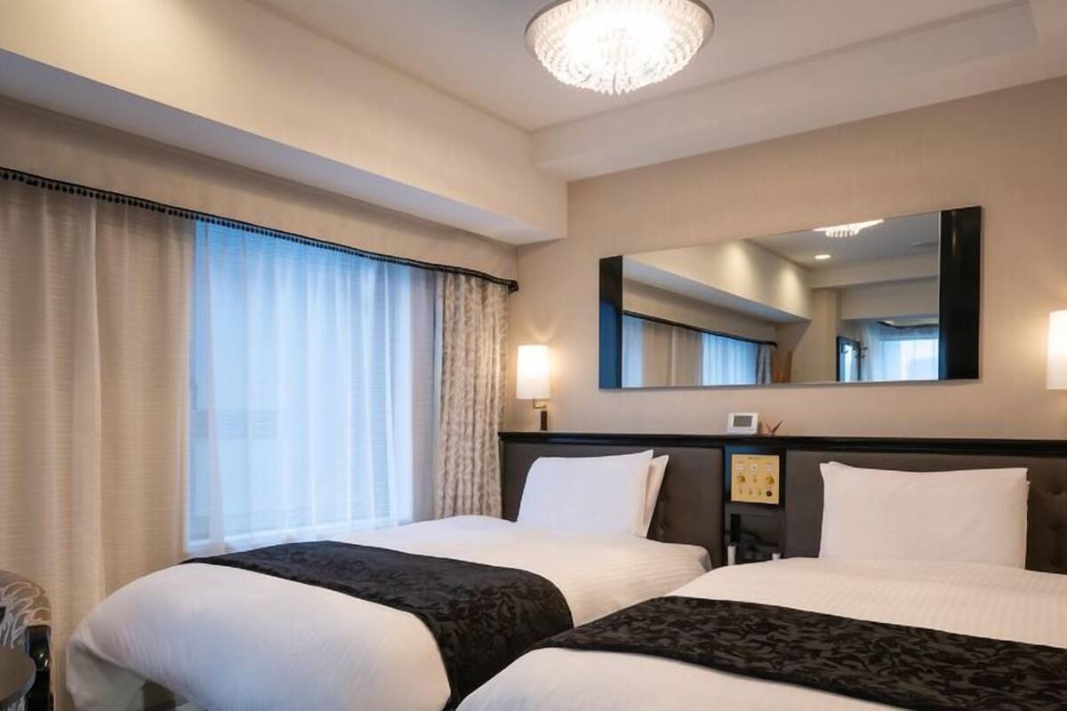 Down comforters, desk, blackout drapes, WiFi (free)