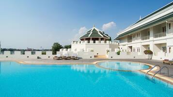 2 outdoor pools, open 7:00 AM to 7:00 PM, pool umbrellas, sun loungers