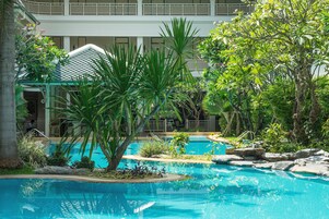 2 outdoor pools, open 7:00 AM to 7:00 PM, pool umbrellas, sun loungers