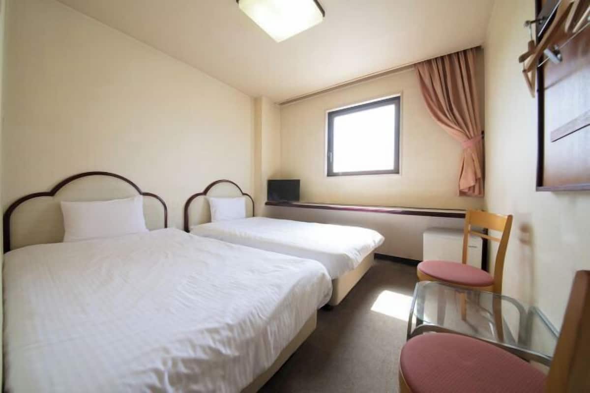 Blackout curtains, free WiFi, bed sheets