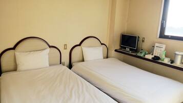 Blackout drapes, WiFi (free), bed sheets