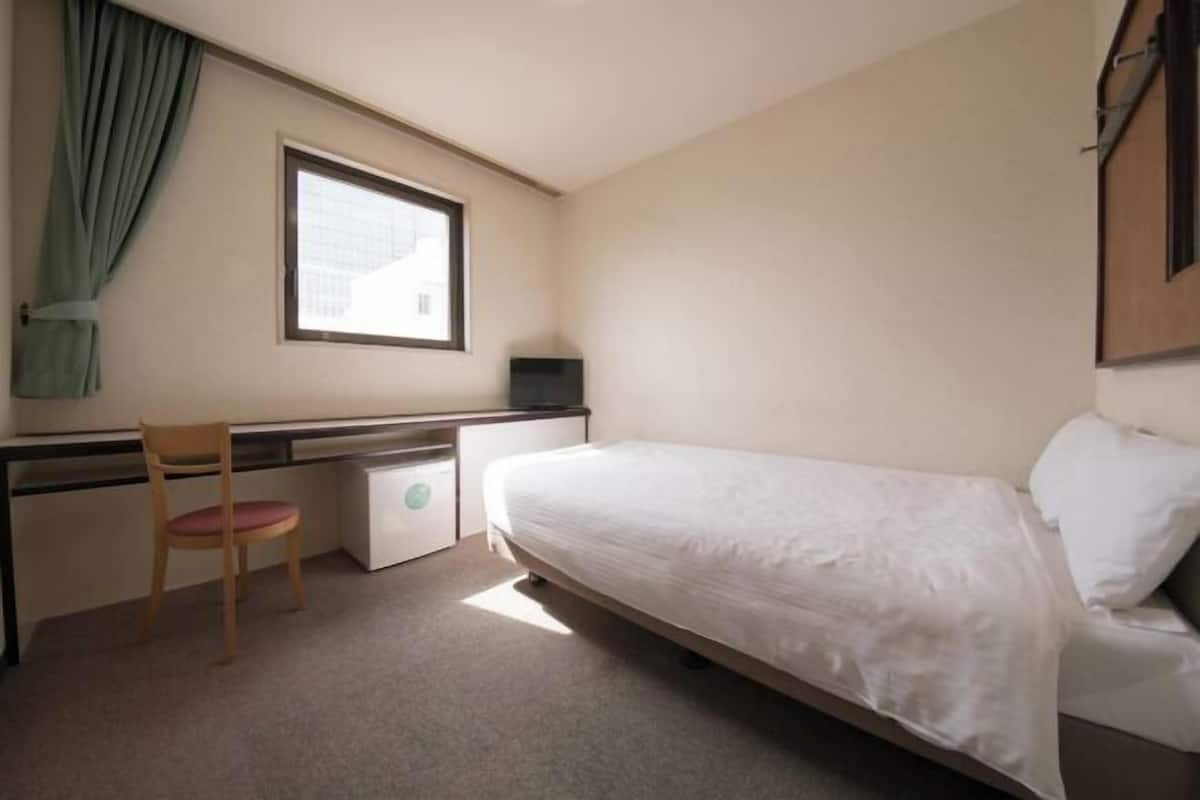 Blackout curtains, free WiFi, bed sheets