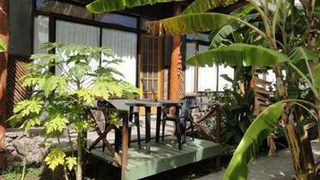 Standard Triple Room, Garden View | View from room