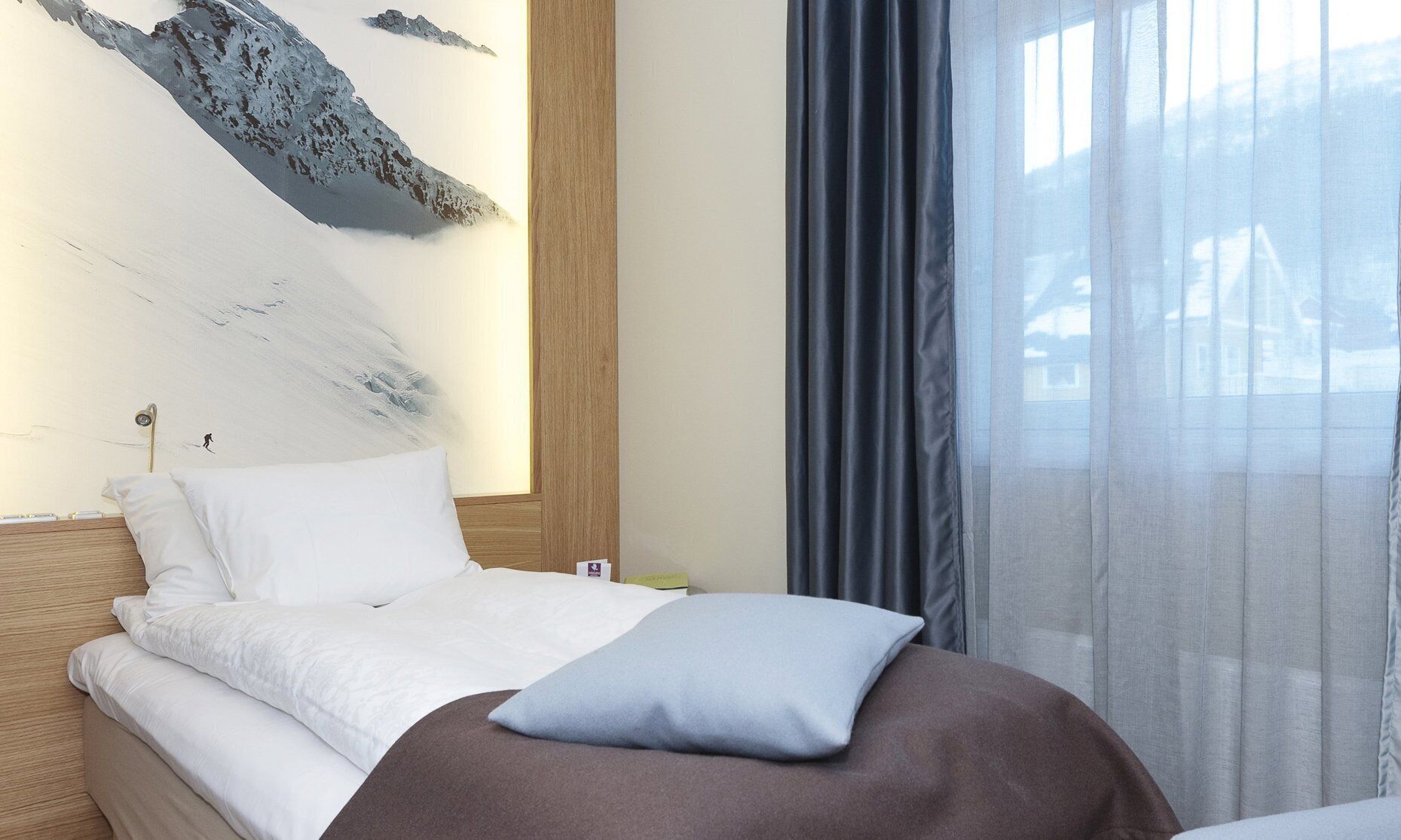Cortinas blackout, Wi-Fi de cortesia, roupa de cama