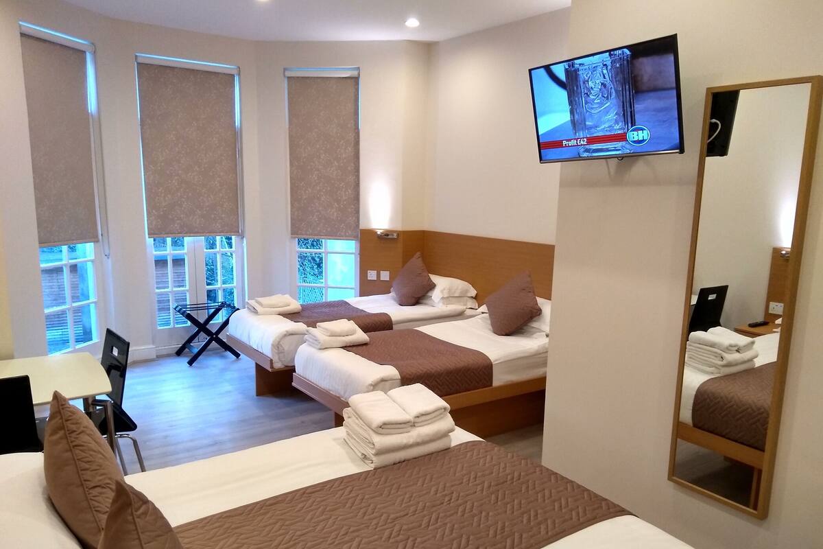 Family Deluxe | In-room safe, desk, blackout drapes, iron/ironing board