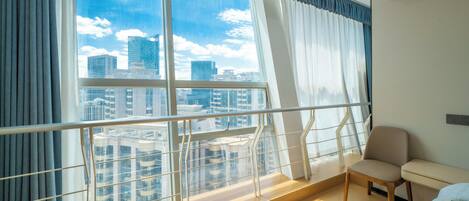 Premium bedding, pillow-top beds, desk, blackout curtains