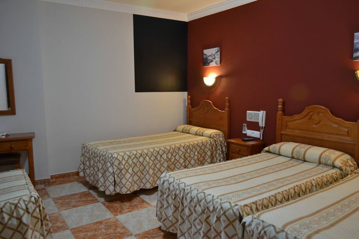 Quarto quádruplo | Wi-Fi de cortesia, roupa de cama