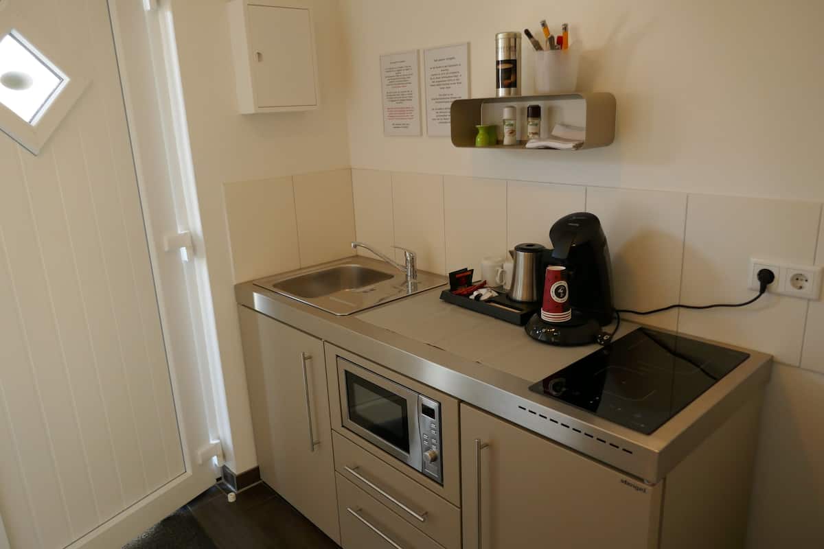 individually furnished, desk, laptop workspace, bed sheets