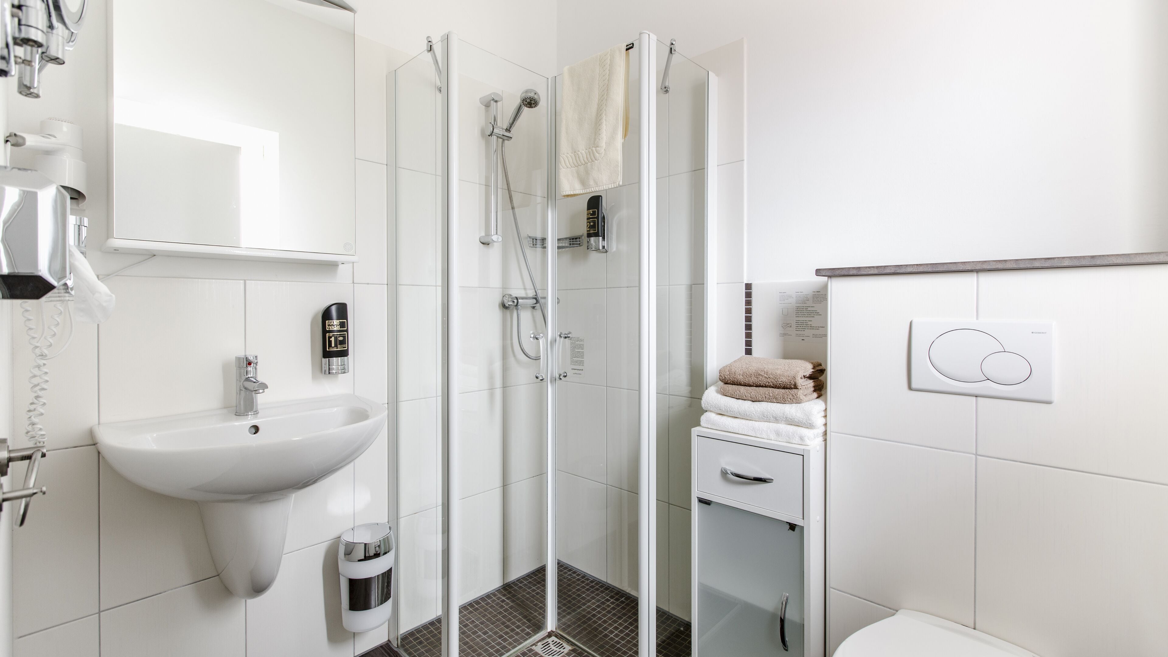 single room | bathroom | shower, hair dryer, towels