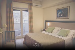 Minibar, in-room safe, desk, laptop workspace