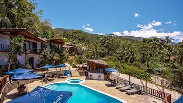 Outdoor pool, pool umbrellas, pool loungers