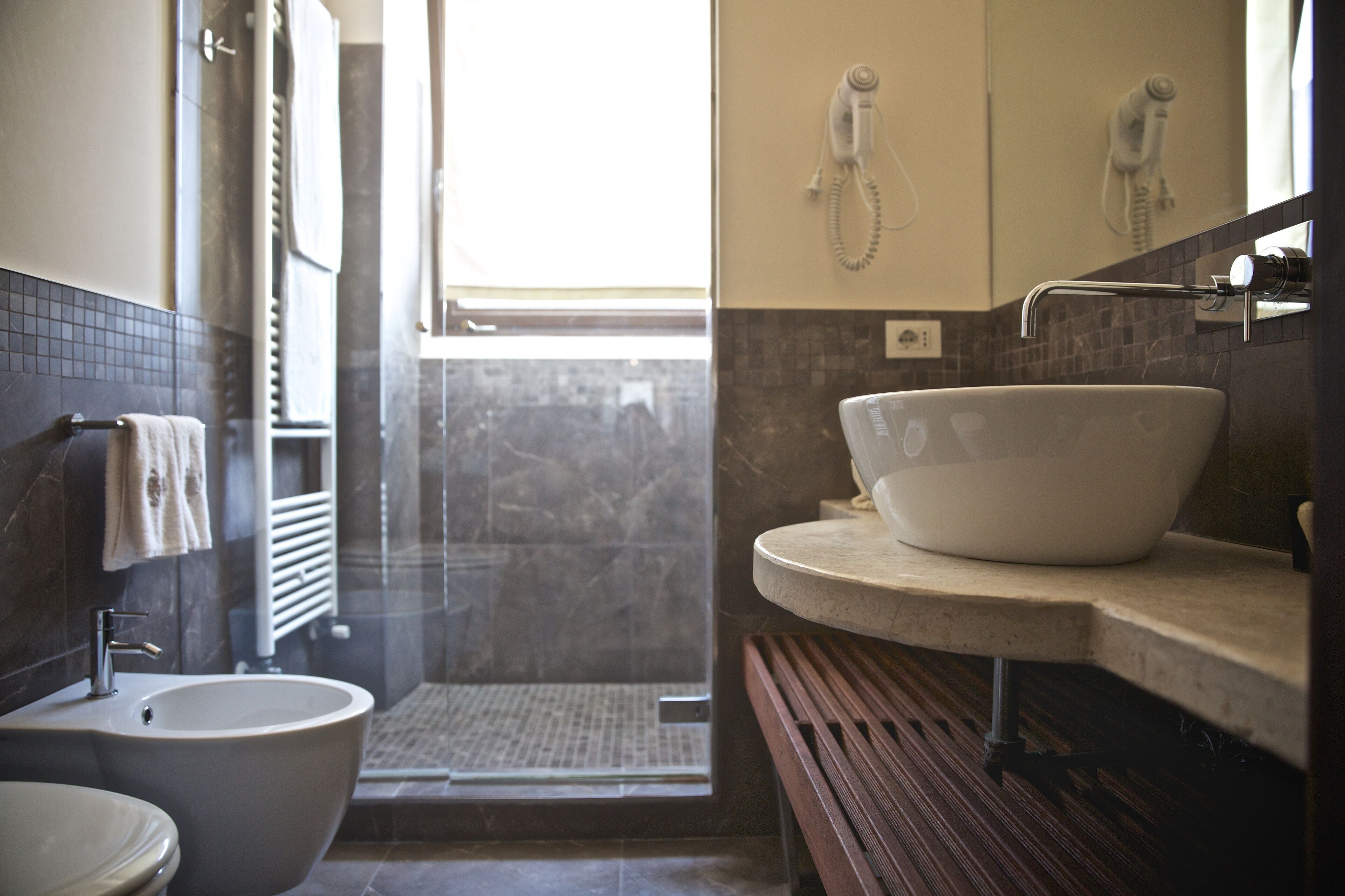 superior double room | bathroom | free toiletries, hair dryer, slippers, bidet